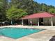 Community pool featuring chairs, picnic tables and nearby restroom facilities at 287 Commonwealth Rd, Mount Pleasant, SC 29466