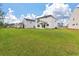 Spacious backyard showcasing ample green space for recreation and outdoor activities at 296 Torslanda Ln, Summerville, SC 29486