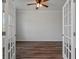 Empty room featuring hardwood floors, a ceiling fan, and french doors at 296 Torslanda Ln, Summerville, SC 29486