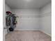 Walk-in closet with carpet and lots of hanging storage for an organized and clutter-free wardrobe space at 296 Torslanda Ln, Summerville, SC 29486