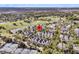Aerial view of a luxury community located near a golf course and scenic water features at 300 Ginned Cotton St, Charleston, SC 29492