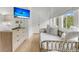 Cozy bedroom with a daybed, dresser, and large windows offering ample natural light at 300 Ginned Cotton St, Charleston, SC 29492