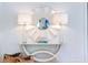 Entryway featuring decorative lamps, a seashell mirror, and stylish console table at 300 Ginned Cotton St, Charleston, SC 29492