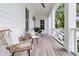 Cozy front porch with seating, perfect for relaxing and enjoying the outdoors at 300 Ginned Cotton St, Charleston, SC 29492