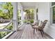 Relaxing front porch with comfortable seating and stylish decor at 300 Ginned Cotton St, Charleston, SC 29492
