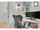 Bright home office with a modern desk, comfortable chair, and lots of natural light at 300 Ginned Cotton St, Charleston, SC 29492