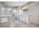 Bright bathroom featuring a vanity, shower with glass door, and tile flooring at 3006 Cross Vine Ln, Summerville, SC 29483