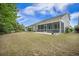 A side view of the house and backyard at 3006 Cross Vine Ln, Summerville, SC 29483