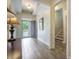 Inviting foyer with tiled floors, open entrance, and staircase to upper level at 3006 Cross Vine Ln, Summerville, SC 29483