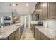 Modern kitchen featuring granite countertops, stainless steel appliances, and a breakfast bar at 3006 Cross Vine Ln, Summerville, SC 29483