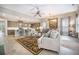 Open concept living space with a spacious kitchen, dining area, and comfortable living room at 3006 Cross Vine Ln, Summerville, SC 29483