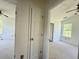Spacious bedroom with neutral carpet, ceiling fan and two bright windows overlooking the lawn at 319 Parish Park, Summerville, SC 29485