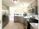 Modern kitchen features stainless steel appliances, sleek countertops, and a view of the breakfast nook at 319 Parish Park, Summerville, SC 29485