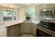 Bright open kitchen with stainless appliances, eat in breakfast area, and large windows overlooking backyard at 319 Parish Park, Summerville, SC 29485