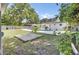 Expansive backyard featuring a pool, patio area, and well-maintained fencing for added privacy at 32 Elmora Ave, Goose Creek, SC 29445