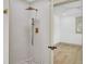 Luxurious bathroom featuring modern shower fixtures, and a view into the bedroom at 32 Elmora Ave, Goose Creek, SC 29445