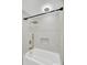 Modern bathroom featuring a soaking tub, rainfall shower head, and inset shelf at 32 Elmora Ave, Goose Creek, SC 29445