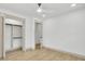 Bright bedroom with attached closet and ensuite bathroom with a light wood floor at 32 Elmora Ave, Goose Creek, SC 29445