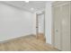 Well-lit bedroom with hardwood floors and a closet for storage at 32 Elmora Ave, Goose Creek, SC 29445