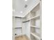 Walk-in closet with custom shelving and hanging rods for maximum organization at 32 Elmora Ave, Goose Creek, SC 29445