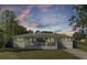 Charming single-story home with a welcoming front porch and well-maintained lawn at 32 Elmora Ave, Goose Creek, SC 29445
