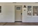 Inviting front door with windows and stylish exterior lighting at 32 Elmora Ave, Goose Creek, SC 29445