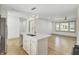 Spacious, open-concept kitchen flowing into a dining area and living room at 32 Elmora Ave, Goose Creek, SC 29445