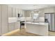 Modern kitchen with sleek countertops, stainless steel appliances, and a stylish island at 32 Elmora Ave, Goose Creek, SC 29445