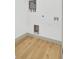 Bright utility room, with laundry hookups and laminate flooring at 32 Elmora Ave, Goose Creek, SC 29445
