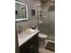 Modern bathroom featuring a glass shower, tiled flooring, a vanity, and contemporary fixtures at 330 Concord St # Th17, Charleston, SC 29401