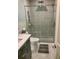 Modern bathroom features a glass-enclosed shower and updated vanity at 330 Concord St # Th17, Charleston, SC 29401