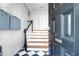 Entryway showing stairs and mailboxes, with black and white tiled floor at 35 Society St # D, Charleston, SC 29401