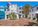Charming Charleston multifamily home with a brick courtyard and white exterior paint at 35 Society St # D, Charleston, SC 29401