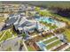 Community aerial view featuring a large pool, tennis courts, bocce ball, and well-maintained landscaping at 403 Hidden Meadow Ln, Summerville, SC 29486