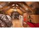 View of attic, showing plywood flooring and wooden beams, and providing ample storage space at 403 Hidden Meadow Ln, Summerville, SC 29486