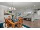 Bright and airy dining room with access to the kitchen and living room at 403 Hidden Meadow Ln, Summerville, SC 29486