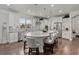 Gourmet kitchen featuring a large island with seating, stainless steel appliances, and ample cabinet space at 403 Hidden Meadow Ln, Summerville, SC 29486