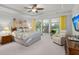 Bright main bedroom with trey ceilings, ceiling fan, and large windows offers a relaxing retreat at 403 Hidden Meadow Ln, Summerville, SC 29486
