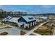 An aerial view of community buildings with well manicured lawns at 403 Ripple Park Dr, Summerville, SC 29486