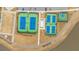 Aerial view showcases a community's tennis courts and basketball court near a pond and a walkway at 403 Ripple Park Dr, Summerville, SC 29486