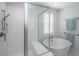 Modern bathroom features a glass-enclosed shower and a freestanding soaking tub at 403 Ripple Park Dr, Summerville, SC 29486