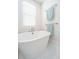 Elegant bathroom featuring a standalone soaking tub and hexagon tiled floors at 403 Ripple Park Dr, Summerville, SC 29486