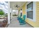 Inviting front porch featuring classic rocking chairs and charming details at 403 Ripple Park Dr, Summerville, SC 29486