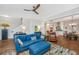Bright living room featuring modern decor and seamlessly connected to the kitchen and dining area at 403 Ripple Park Dr, Summerville, SC 29486