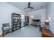 Spacious home office with built-in bookshelves, desk space, and natural light at 403 Ripple Park Dr, Summerville, SC 29486