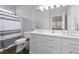 A modern bathroom offers dual sinks, tile floors, and a shower/tub combo at 4872 Law Blvd, Summerville, SC 29485