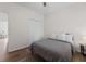 A bedroom features a window, modern flooring, and a closet at 4872 Law Blvd, Summerville, SC 29485