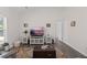 The bright living room offers modern flooring and neutral paint at 4872 Law Blvd, Summerville, SC 29485