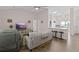 The living room features hardwood floors and flows into the kitchen and dining area at 4872 Law Blvd, Summerville, SC 29485