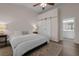 A main bedroom features hardwood floors and an ensuite bathroom at 4872 Law Blvd, Summerville, SC 29485